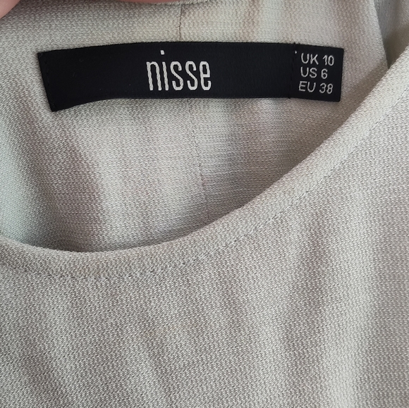 Chic Beige Dress with Black Strap details on back - Picture 12 of 13